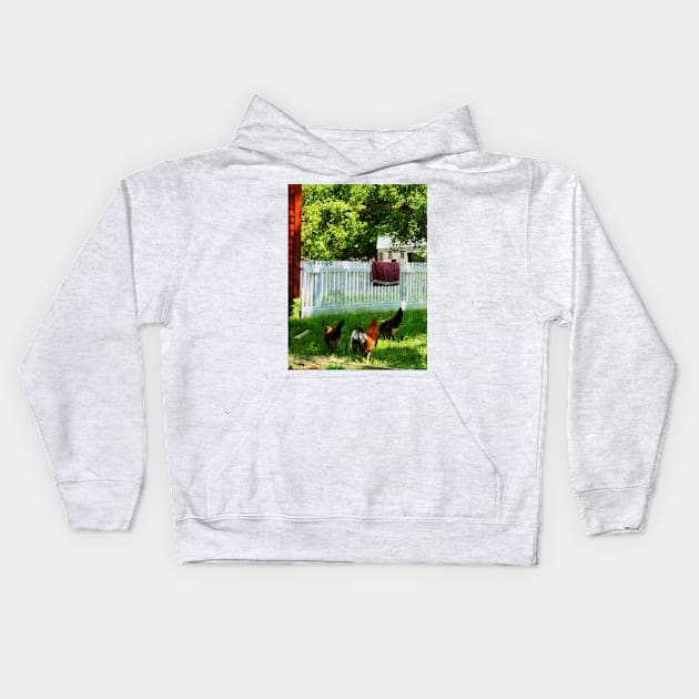 Housekeepers - Laundry Hanging on Fence Kids Hoodie by SusanSavad